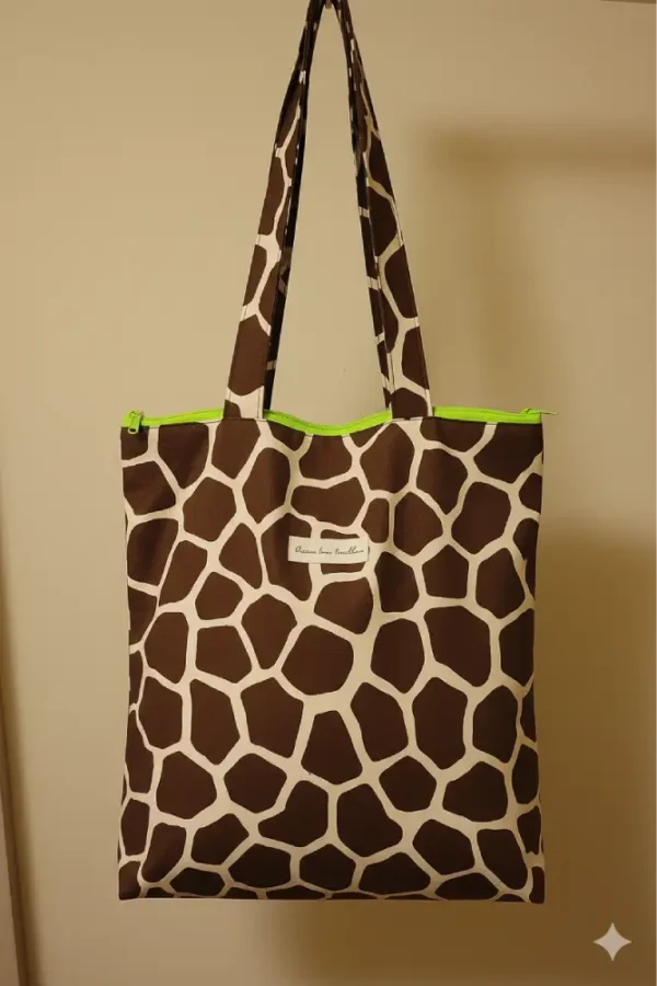 Bolsa de tela estilo tote bag con estampado de jirafa