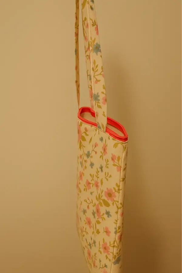 bolso flores naranja lateral Bolsa de tela tote bag floral con cremallera rosa fucsia