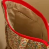 Bolsa de tela tote bag con estampado de flores pequeñas y cremallera roja